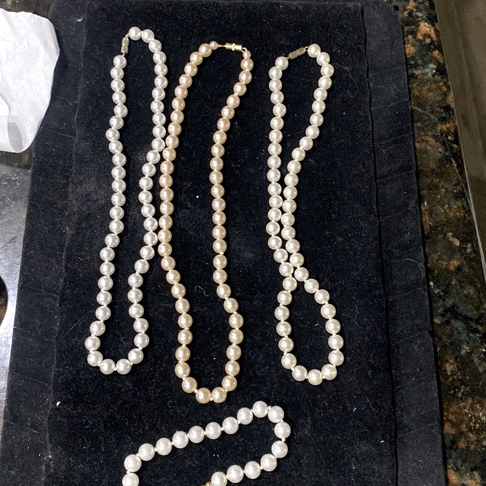 Faux pearl necklaces